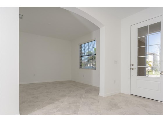 Spacious dining room off the foyer - Single Family Home for sale at 1837 East Isles Rd, Port Charlotte, FL 33953 - MLS Number is D6122330