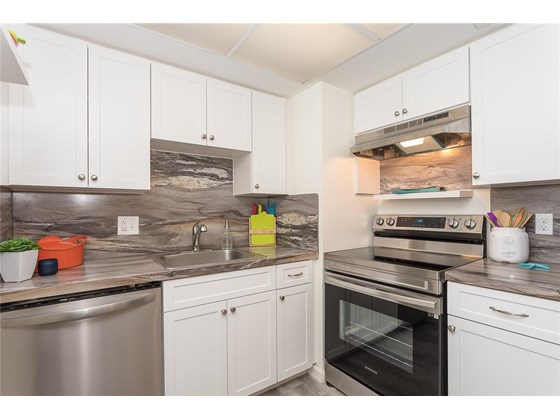 All modern stainless appliances - Condo for sale at 66 Boundary Blvd #280, Rotonda West, FL 33947 - MLS Number is D6122649