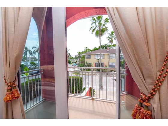 Bedroom 3 Balcony - Single Family Home for sale at 2300 Pass A Grille Way, St Pete Beach, FL 33706 - MLS Number is U8140258