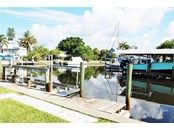 48ft dock with boat lift - Single Family Home for sale at 1345 Holiday Dr, Englewood, FL 34223 - MLS Number is C7449205