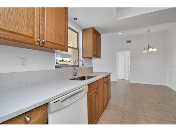 Kitchen - Single Family Home for sale at 120 Sinclair St Sw, Port Charlotte, FL 33952 - MLS Number is C7450500