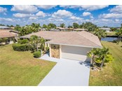 Single Family Home for sale at 120 Sinclair St Sw, Port Charlotte, FL 33952 - MLS Number is C7450500