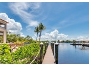 90' dock with tie ups for other boats - Single Family Home for sale at 2755 Cussell Dr, Saint James City, FL 33956 - MLS Number is C7451799
