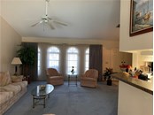 Formal living room off kitchen - Single Family Home for sale at 4200 Swensson St, Port Charlotte, FL 33948 - MLS Number is C7452315
