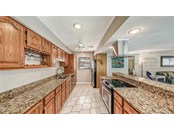 Kitchen with granite countertop - Single Family Home for sale at 373 Avenida Madera, Sarasota, FL 34242 - MLS Number is A4510043