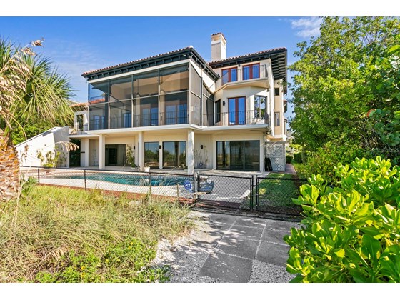 East angle of the back of the estate - Single Family Home for sale at 6211 Gulf Of Mexico Dr, Longboat Key, FL 34228 - MLS Number is A4511733