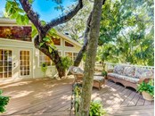 Beautifully shaded private deck - Single Family Home for sale at 5227 Siesta Cove Dr, Sarasota, FL 34242 - MLS Number is A4519271