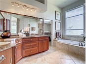 Double sinks in the first ensuite - Single Family Home for sale at 319 Stone Briar Creek Dr, Venice, FL 34292 - MLS Number is A4522164