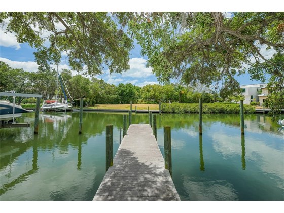 TWO Deeded Dock Slips with Power and Water Available - Single Family Home for sale at 1460 Rebecca Ln, Sarasota, FL 34231 - MLS Number is N6115705